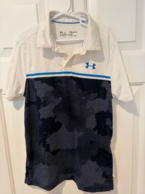 Boys short sleeve polo size medium by Under Armour. White and blue colors.